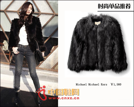 黑色的皮草外套做成短打的款式,肩部的設計使得整件衣服開起來很立體